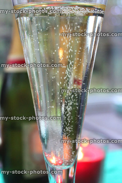 Stock image of champagne flute glass filled with sparkling white wine