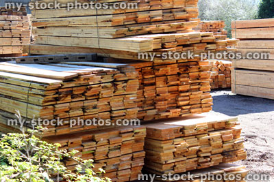 Stock image of stacked lumber at the timber yard / sawmill