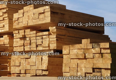 Stock image of lumber / timber yard, piles of wood planks / outdoors