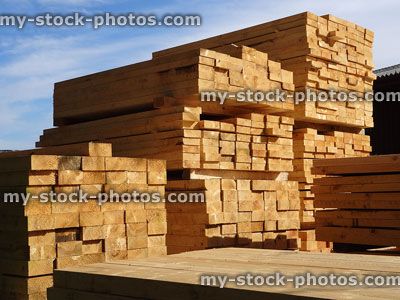 Stock image of lumber / timber yard, stacks of pine wood planks / boards