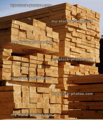 Stock image of lumber / timber yard, stacks of wood planks / posts