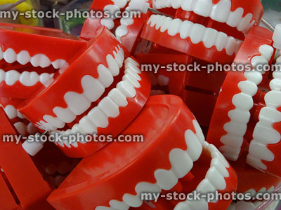 Stock image of red plastic wind up chattering teeth in joke shop