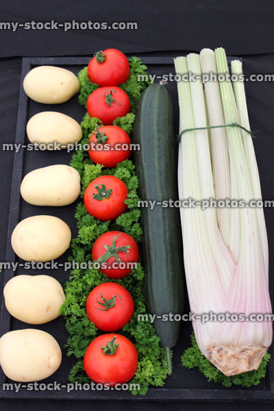 Stock image of prize winning vegetables, tomatoes, cucumber, celery, potatoes, flower show exhibition