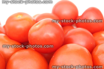 Stock image of fresh, red salad tomatoes in pile, high fibre