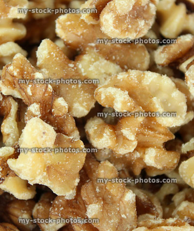 Stock image of pile of shelled walnuts / nuts, healthy food snack, health benefits