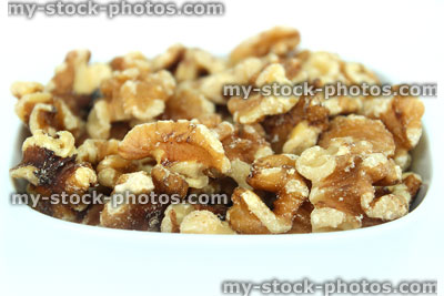 Stock image of pile of shelled walnuts / nuts, healthy food snack, natural protein
