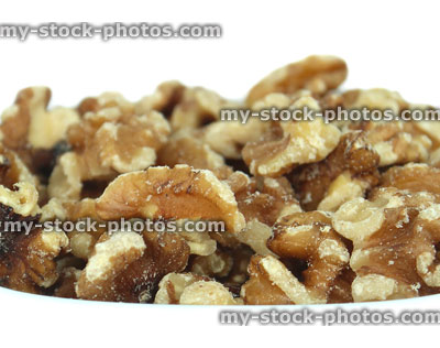 Stock image of pile of shelled walnuts / nuts, healthy food snack, vitamins