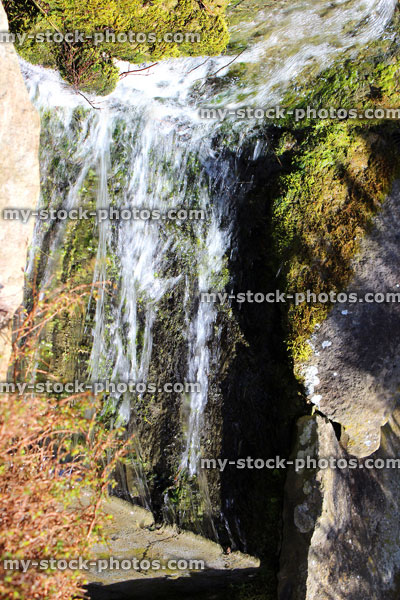 Stock image of cascading waterfall in rock garden / rockery, running water / stream