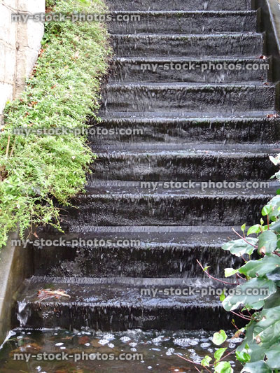 Stock image of staircase waterfall, cascade of water flowing down steps
