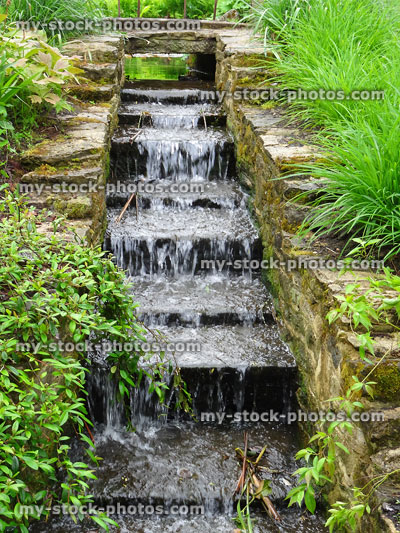 Stock image of staircase waterfall steps, natural garden stream water feature