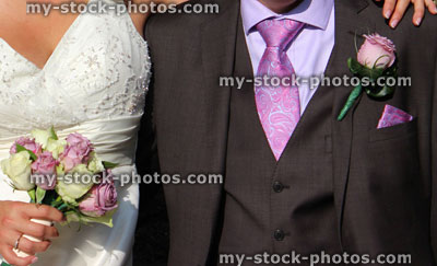Stock image of newly married couple, bride and groom, wedding dress