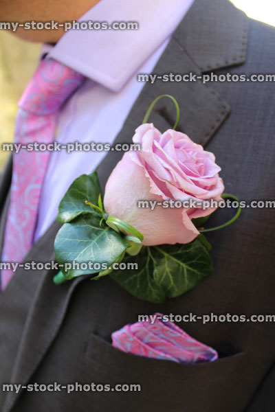 Stock image of bridegoom / groom at wedding, buttonhole rose, suit, tie, handkerchief