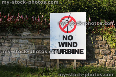 Stock image of roadside sign saying 'No Wind Turbine', environmentally friendly