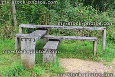 Stock image of L shaped, angular interlocking wooden benches in public park