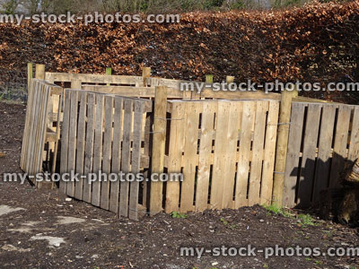 Stock image of homemade compost heaps, made with pallet wood crates