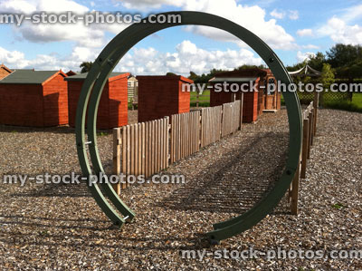 Stock image of circular pergola made from curved wood, round tunnel