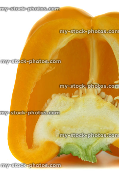 Stock image of yellow pepper halved / capsicum, cross section, cut in half