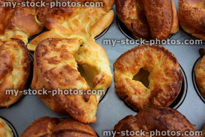 Stock image of tray of freshly made, well risen Yorkshire puddings