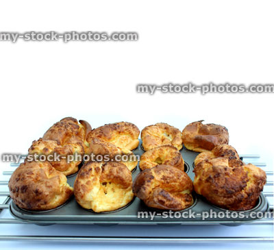 Stock image of tray of freshly made, well risen Yorkshire puddings